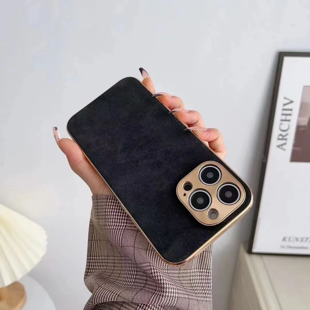 Slim black leather texture phone case fitted on an iPhone 14, showing textured finish and precise camera cutouts.