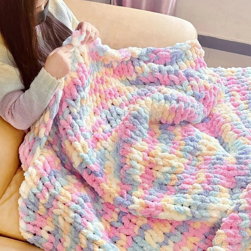 Coarse yarn chenille knitted blanket with braided gravity detail in modern colour option