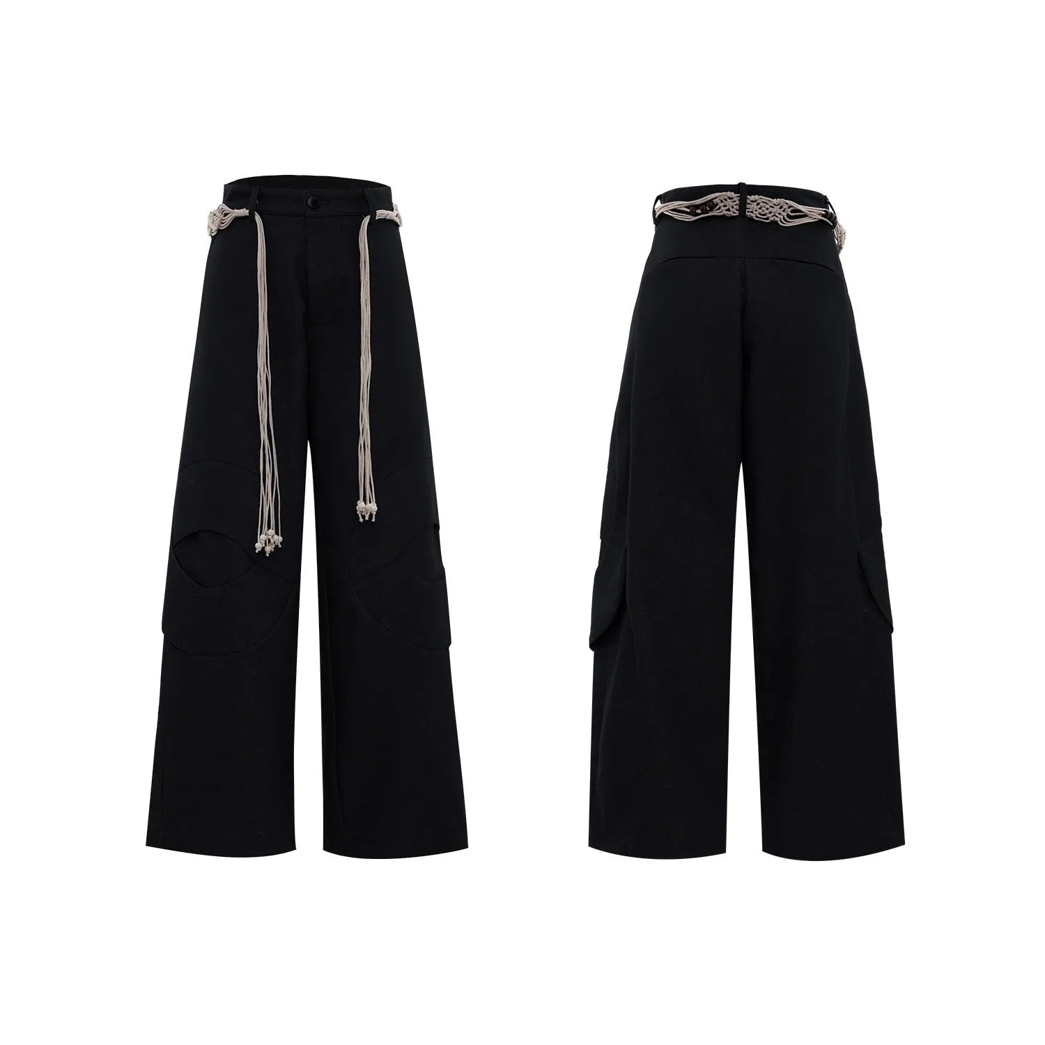 Man wearing dark blue cotton straight-leg trousers with heavy 3D belt stitching and decorative tassel details.