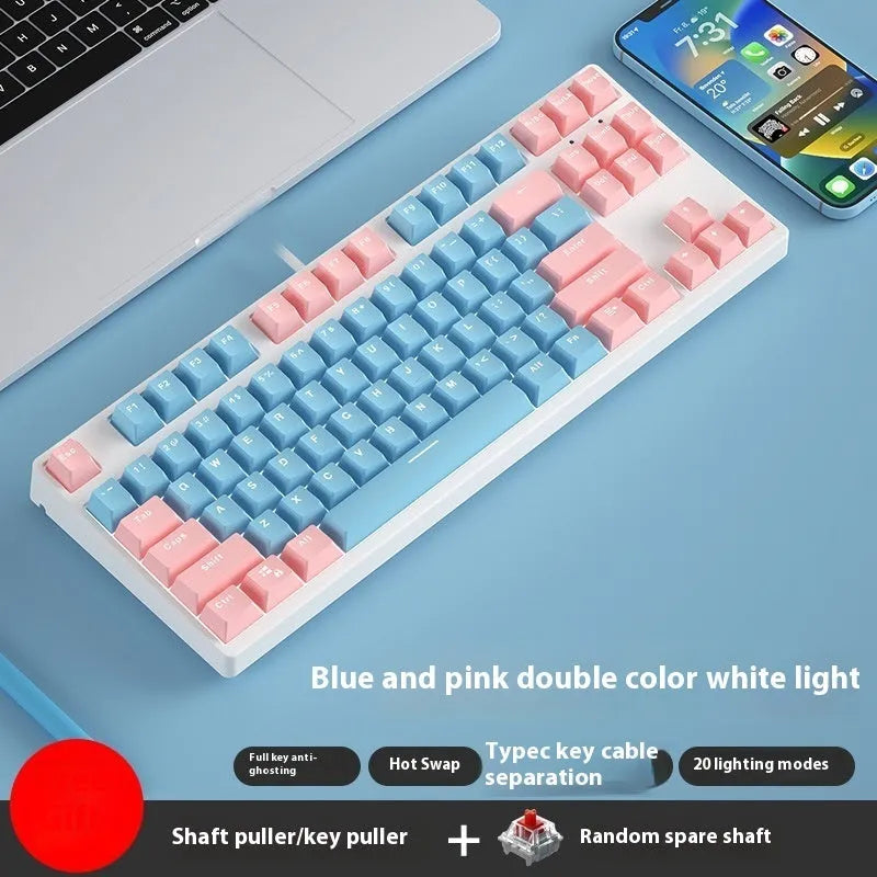87-key wired mechanical keyboard with two-tone keycaps, shown with switch puller and cleaning brush