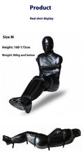 Black patent leather bondage set with full-coverage garment and six ratchet tie-down pieces