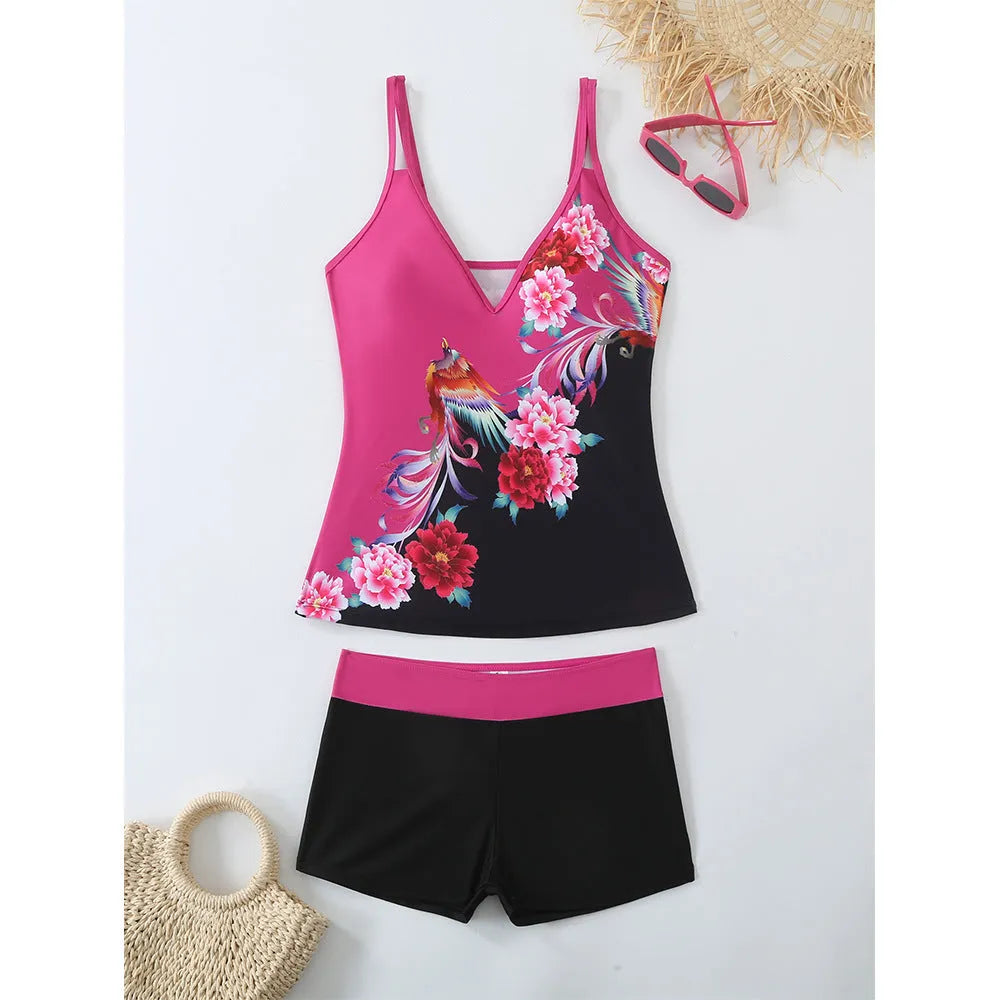 Women's plus size black and rose red two-piece swimsuit bikini set on a mannequin.