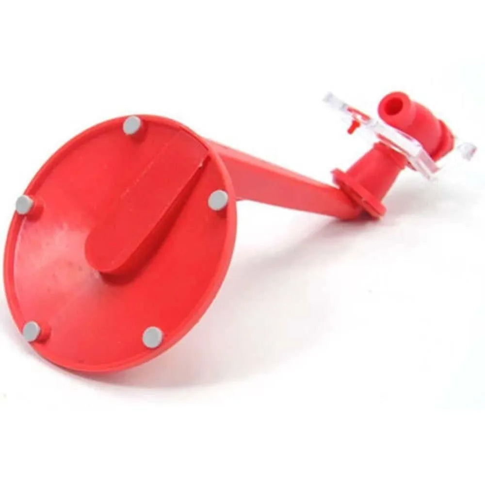 Red plastic Magic Tap soda dispenser attached to an inverted 2-litre bottle