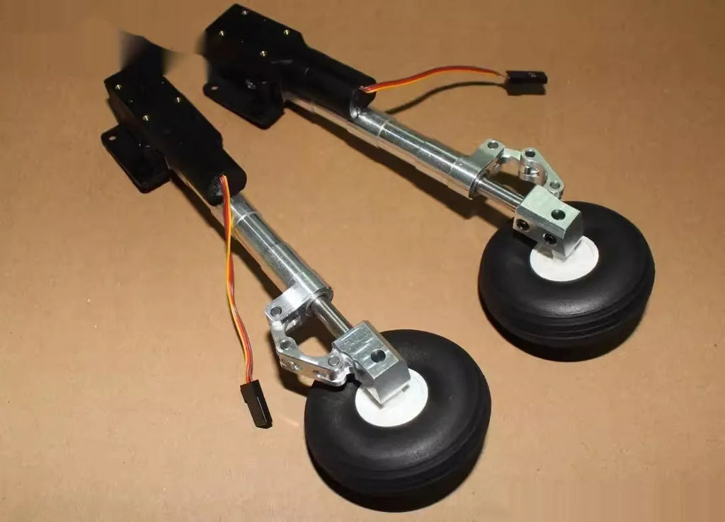 Alloy retractable shock-absorbing landing gear for model aircraft with optional wheels.