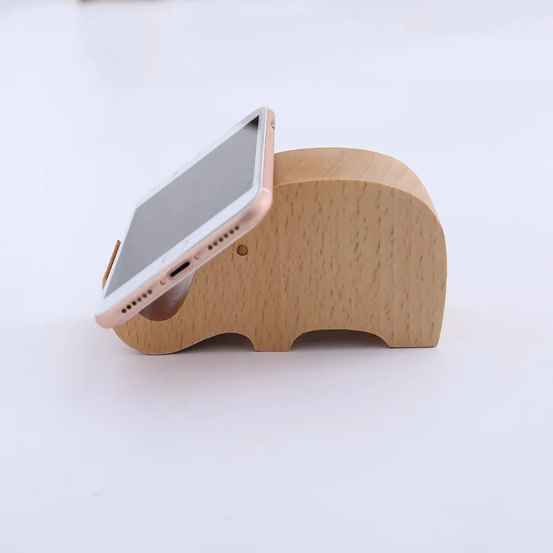 Handcrafted beech wood and resin lazy bracket mobile phone holder on a wooden desk