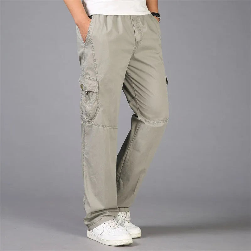Cotton loose straight leg cargo trousers in black with multiple pockets and zip fly