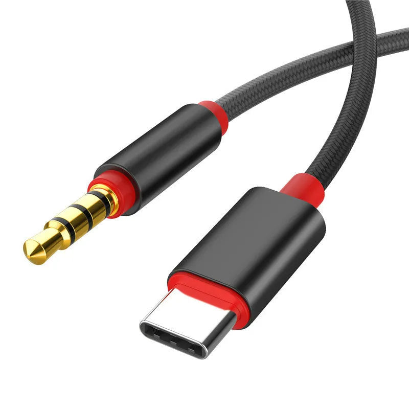 Silver nylon-braided 3.5mm male-to-male auxiliary audio cable with nickel connectors.