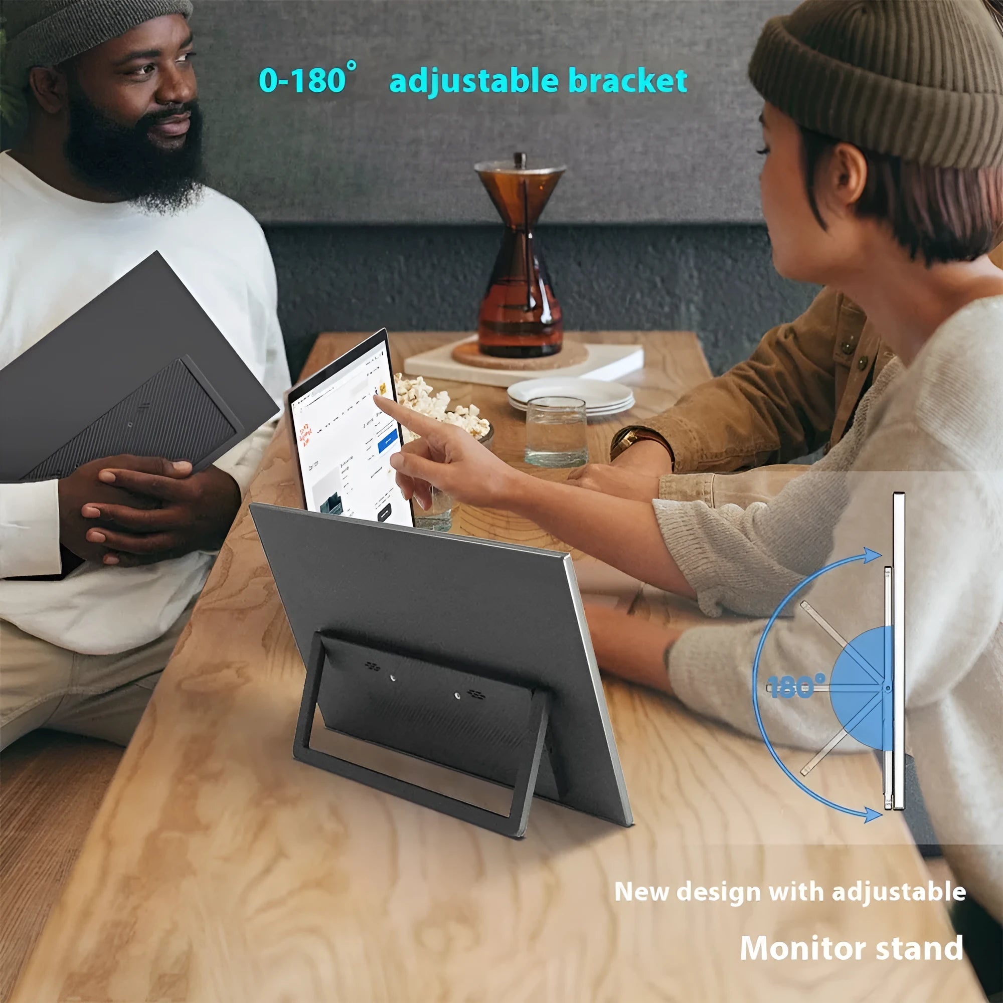 Black 15.6-inch portable IPS monitor on its adjustable stand, showing a desktop application.