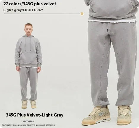 Men's solid colour cotton velvet sweatpants with elastic waist and ankle banding detail