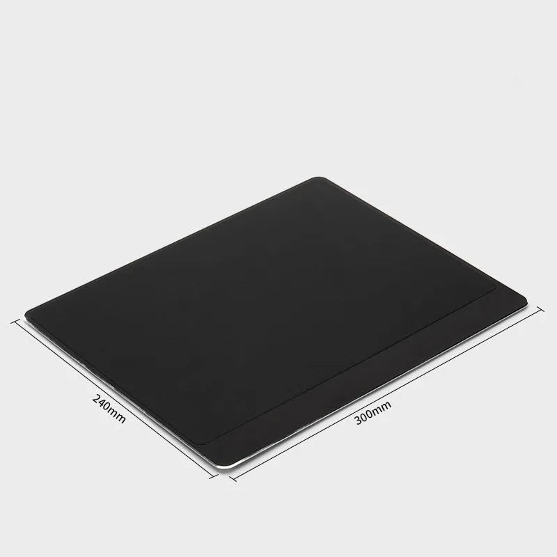 Metal alloy desk mat mouse pad in silver, large size, on a wooden desk