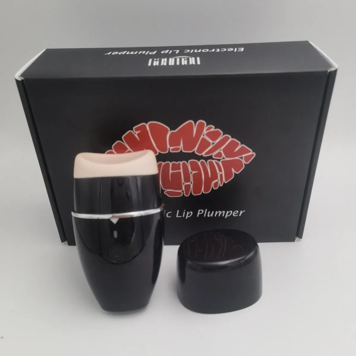 Electric lip plumper device with USB cable in black or white colour options