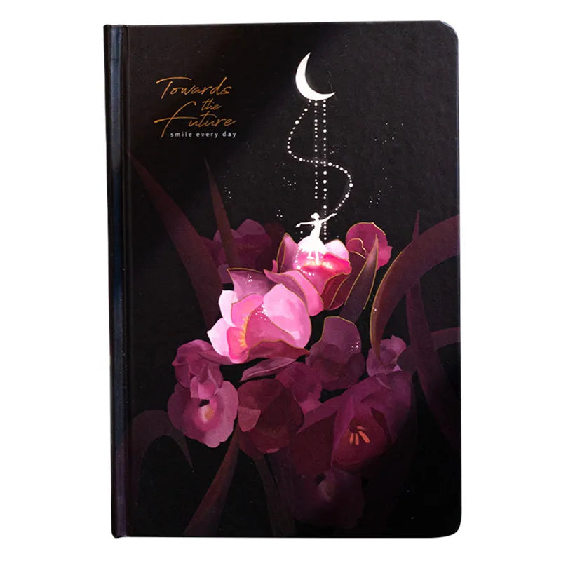 A5 notebook with luminous reflective cover open to show pages with colourful illustrated backgrounds.