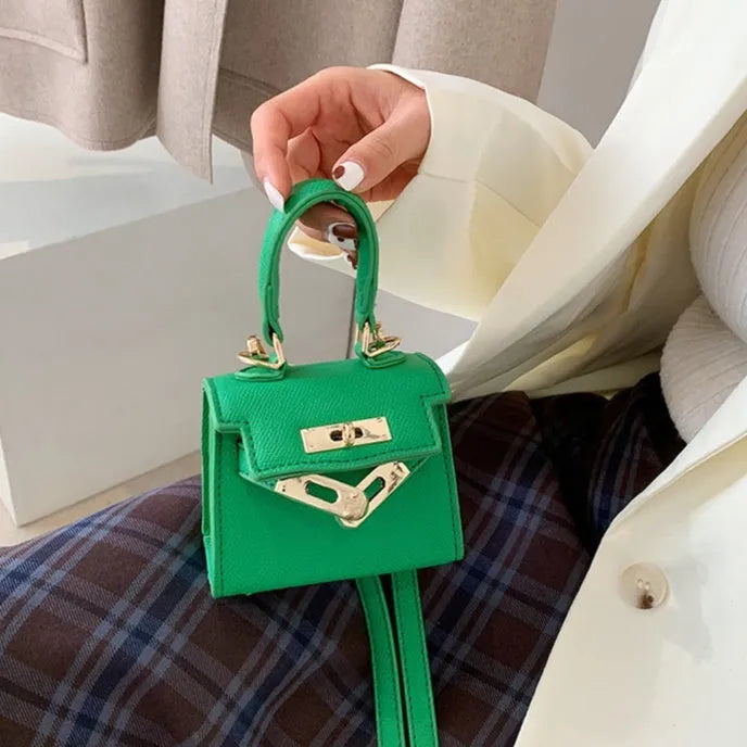 Mini one shoulder crossbody handbag, PU small square bag with lock closure, solid colour, front view