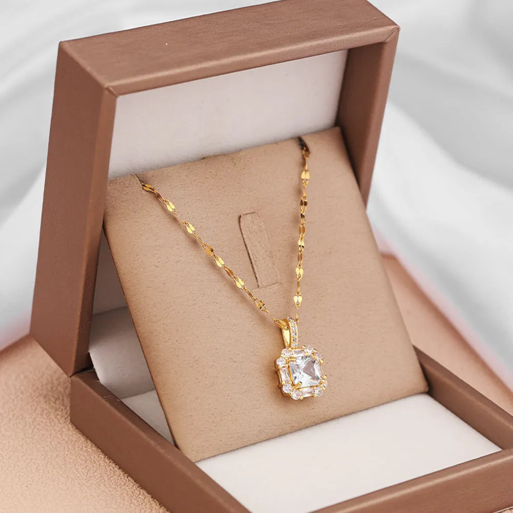 Gold clavicle chain necklace with geometric zircon pendant on titanium steel wave chain