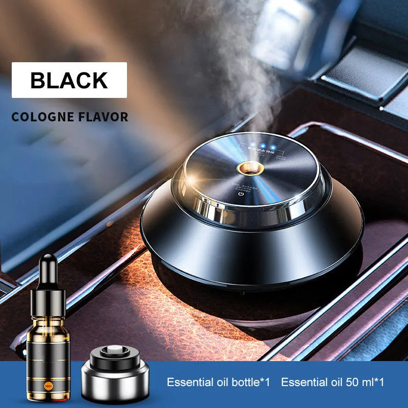 Intelligent black metal Butterfly design car aromatherapy air purifier with USB cable and essential oil bottle.
