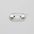 Black magnetic glasses holder on a fridge door with spectacles stored
