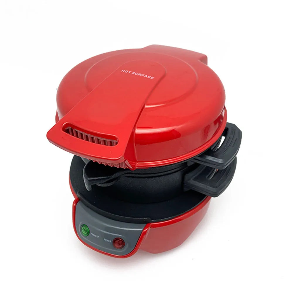 Bright red breakfast sandwich maker with egg cooking ring and waffle plates on kitchen counter