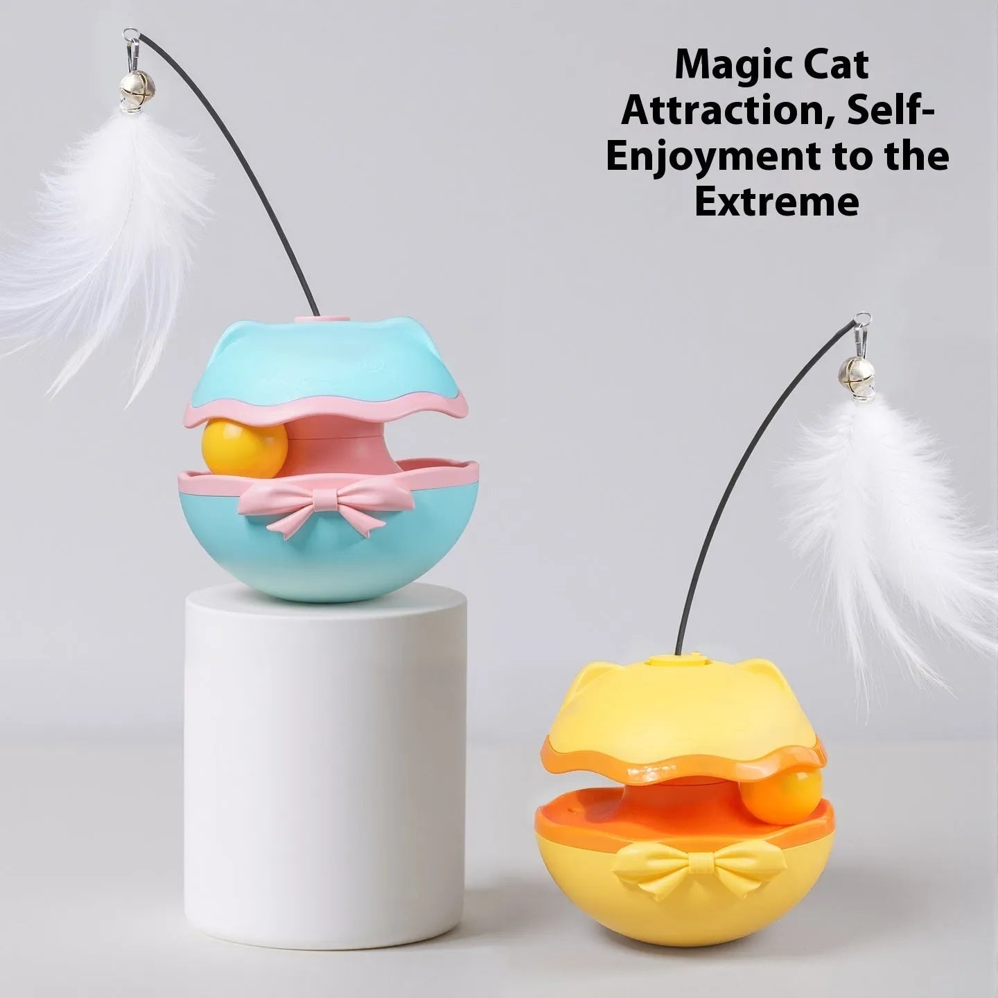 Electric self-righting cat teaser tumbler toy in lemon yellow, sky blue, and soft fog grey on a hardwood floor.