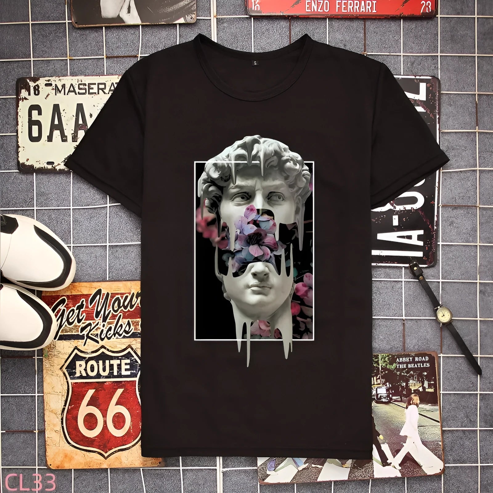 Mens black loose-fit short-sleeved t-shirt with round neck and heat transfer print, size 2XL available