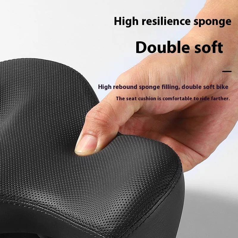 Black leather bicycle seat cushion with polyurethane foam filling for shock absorption on a bike saddle.