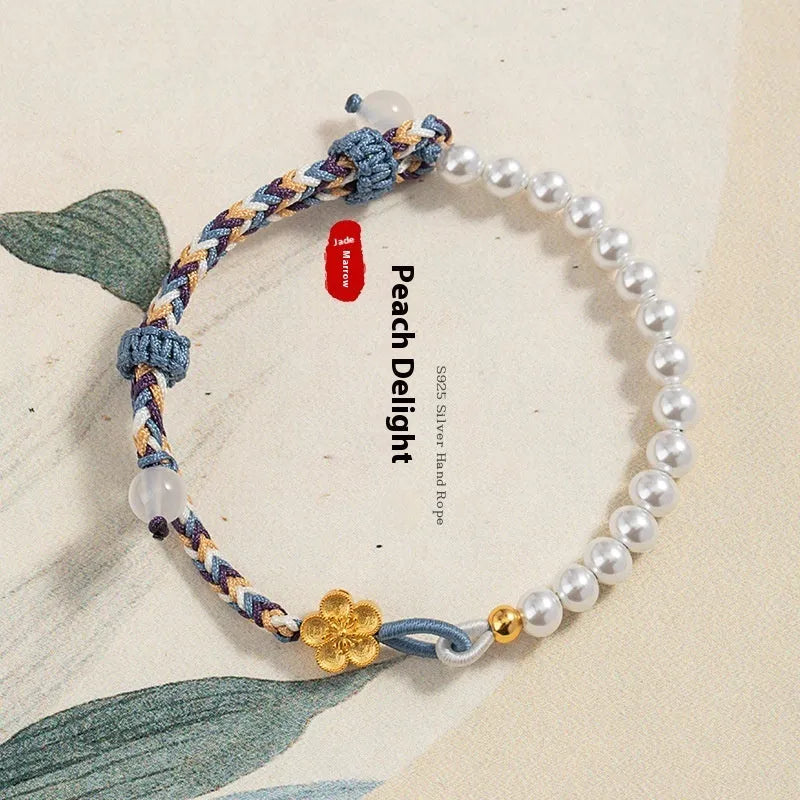 Peach-coloured sterling silver bracelet with Chinese flower weaving and pearl decoration