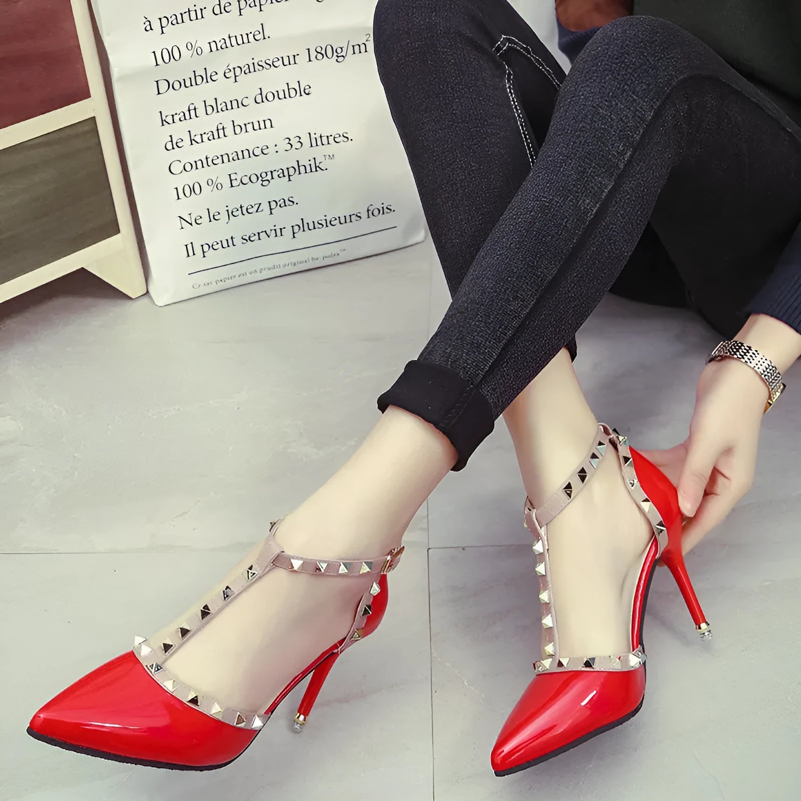 Studded pointed high heels in Black with stiletto heel and buckle fastening