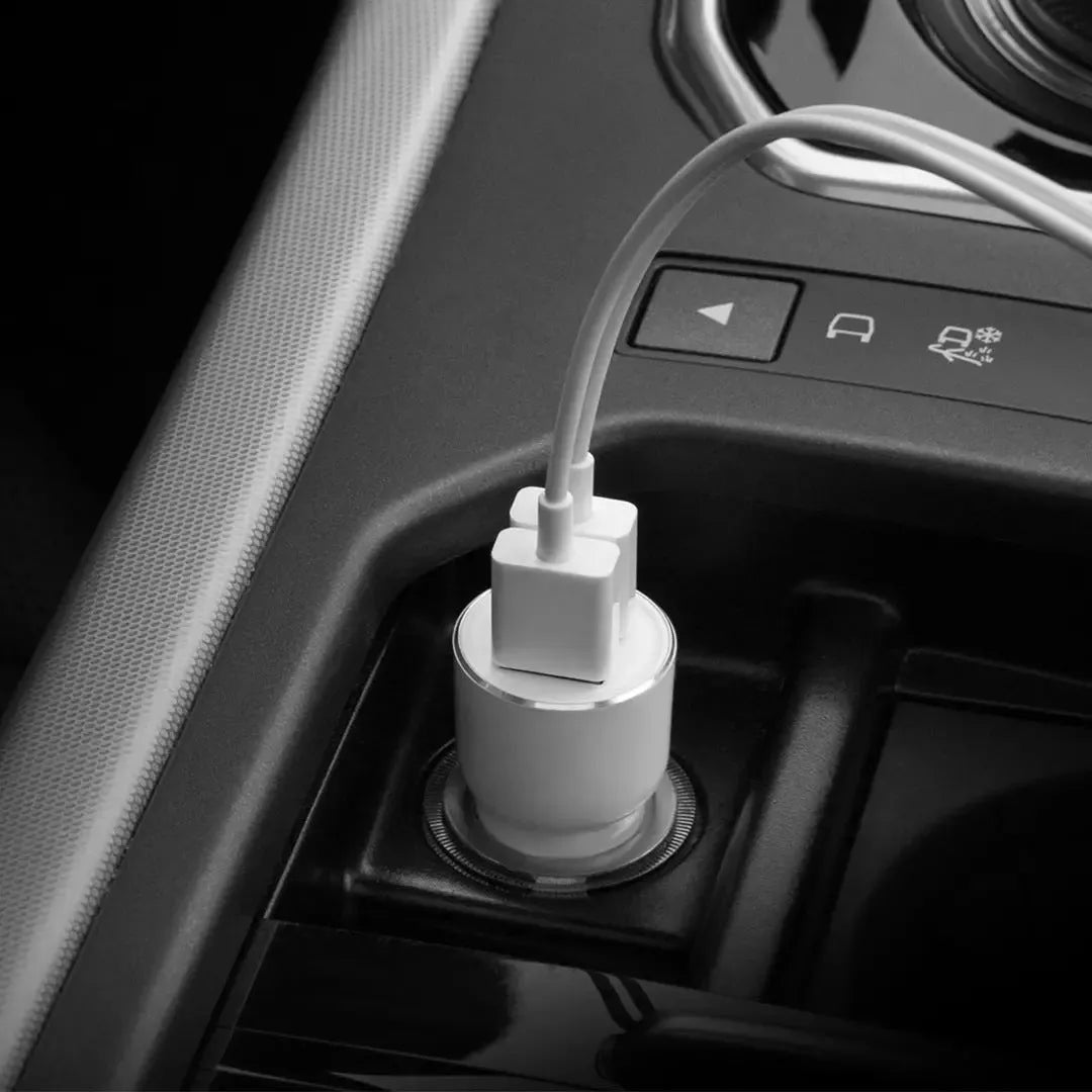 Black Ruimi 3S Music Bluetooth Car Charger with USB port for in-vehicle phone and tablet charging.