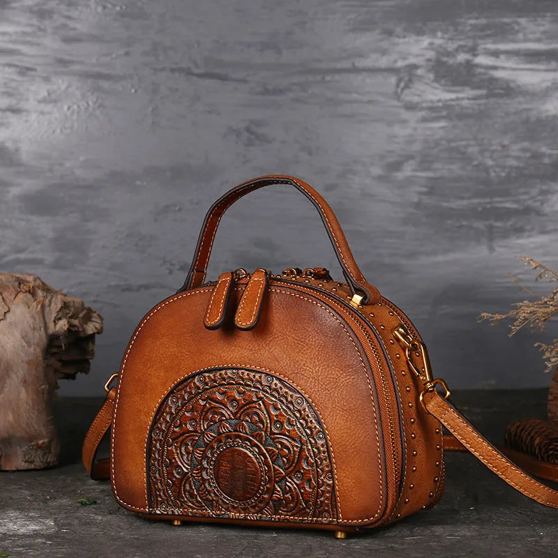 Vintage suede cowhide leather handbag showing interior organisation compartments