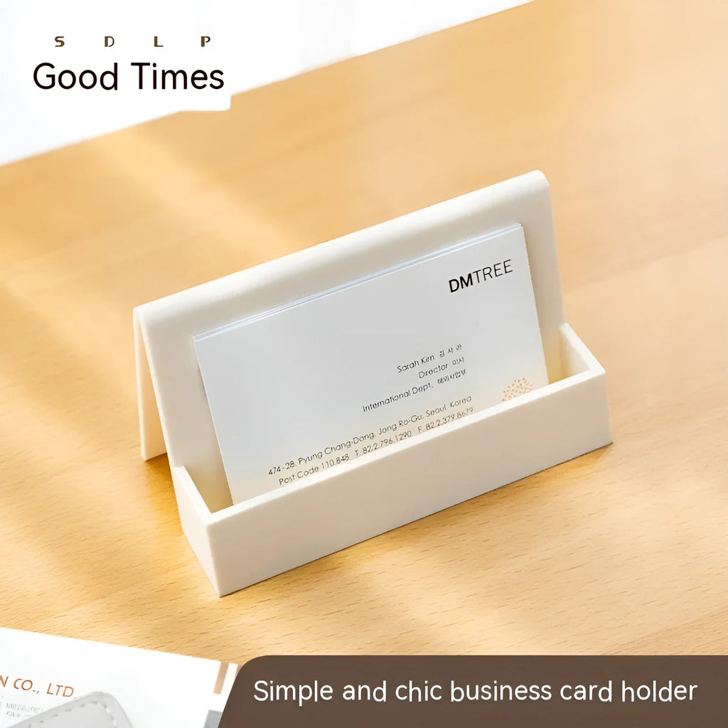 Creative PS business card storage display stand holding 20 cards in a geometric shape