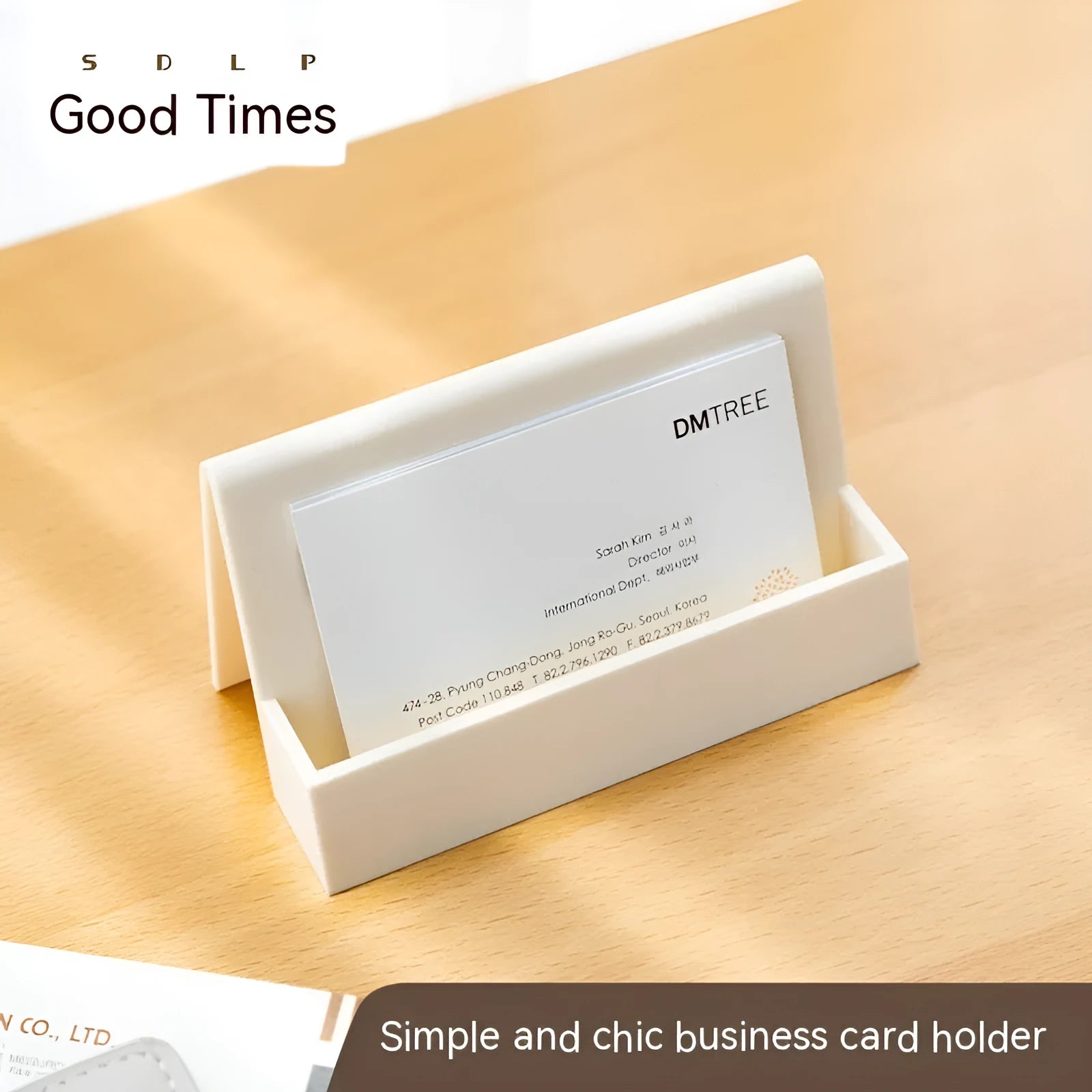 Creative PS business card storage display stand holding 20 cards in a geometric shape