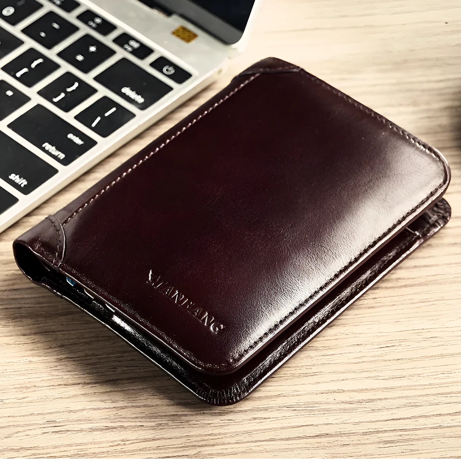 Men's black full-grain leather bifold wallet open, showing card slots, zip coin pocket, and banknote section.