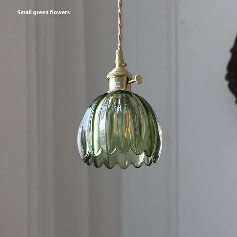 Vintage Nordic style glass flower chandelier with coloured shades in bedroom setting