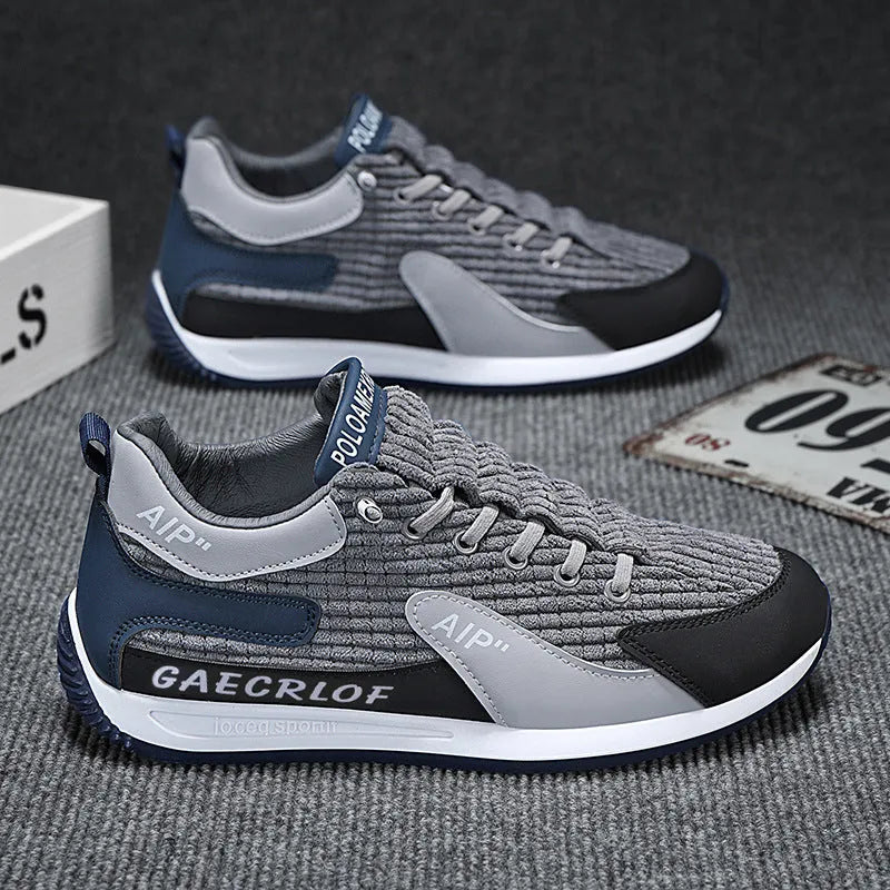 Men's green and grey low-top mesh running shoes with lace-up front and round toe.
