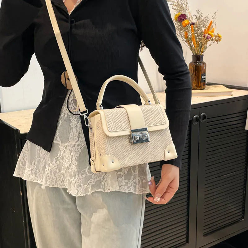 PU leather crossbody bag in horizontal square shape with sewing thread detail, available in seven colours