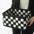 Checkerboard patterned grey felt folding storage basket with open top