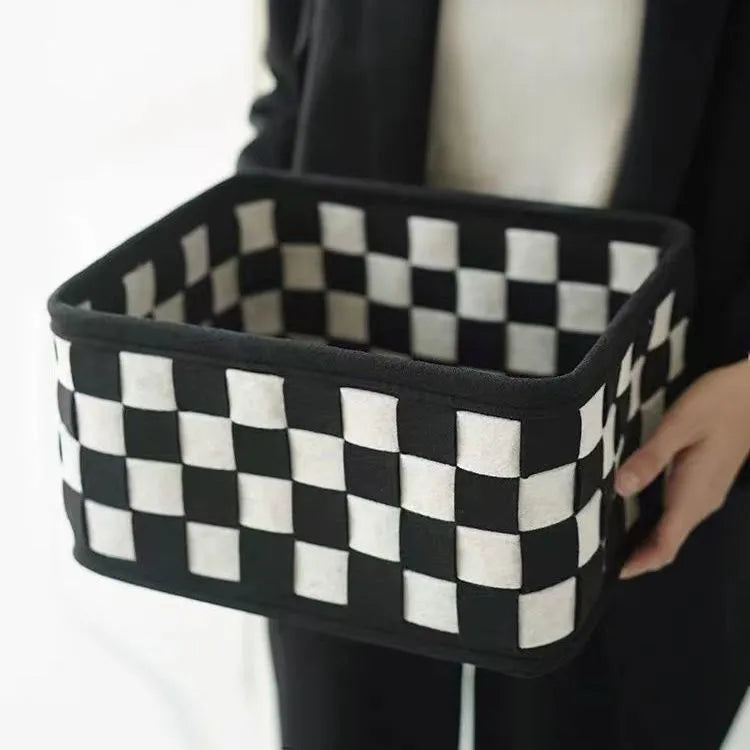Checkerboard patterned grey felt folding storage basket with open top