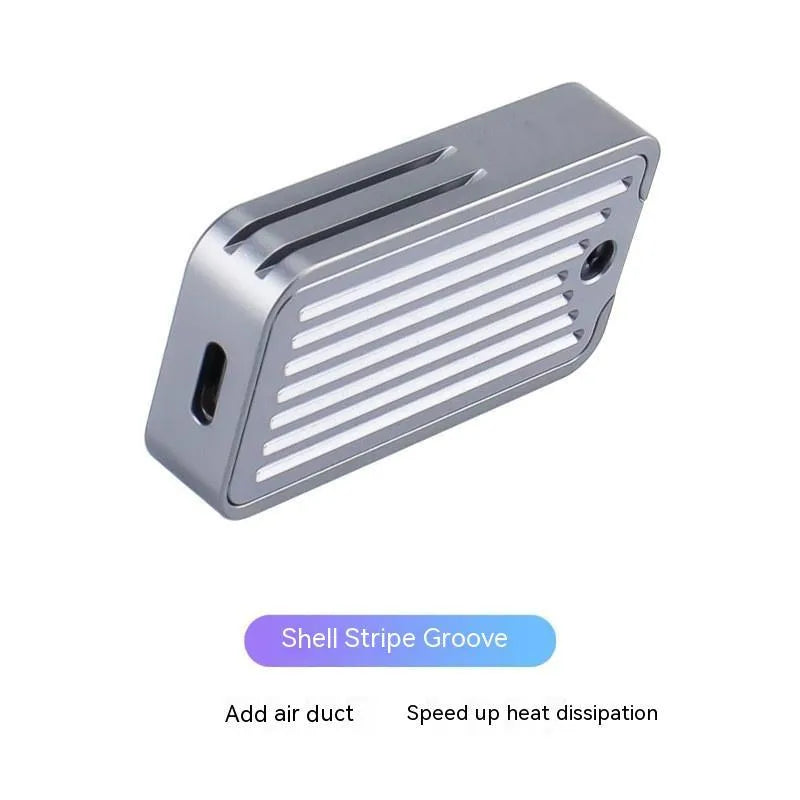 Aluminium M.2 NVMe SSD enclosure with USB-C cable, showing compact metal construction.