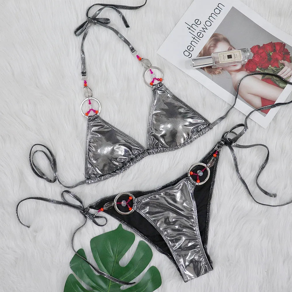 Silver women's bikini swimsuit with briefs bottom on mannequin