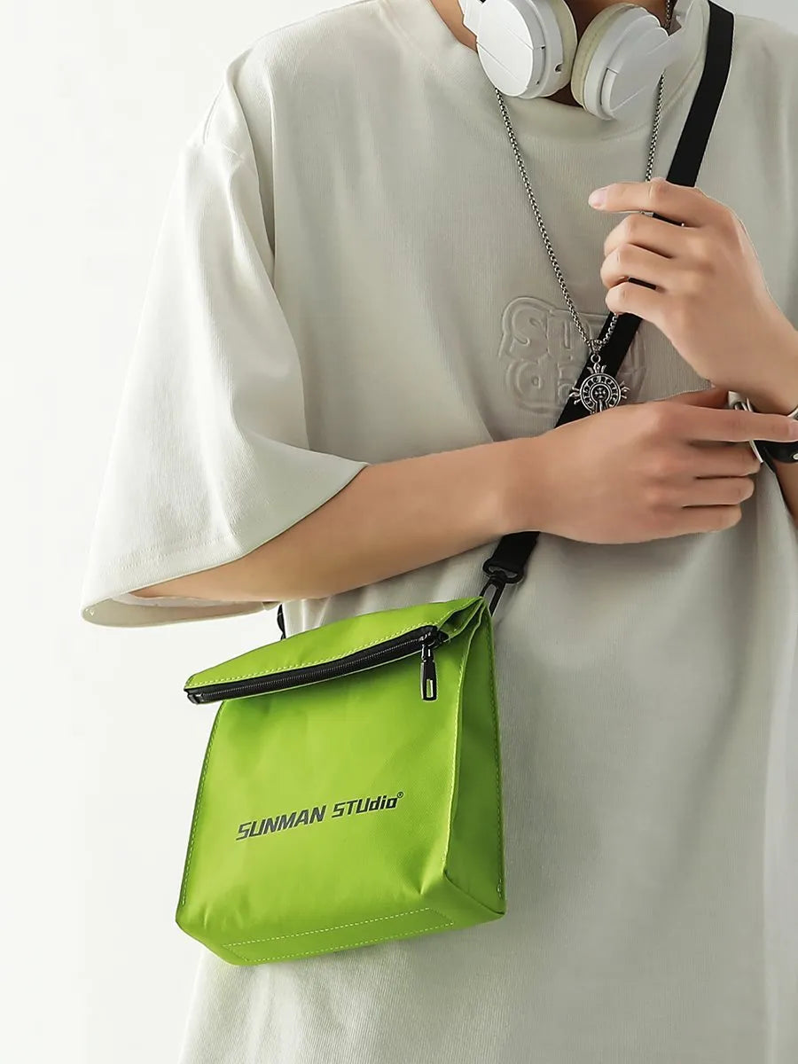 Messenger design backpack in polyester with crossbody strap and sewing line detailing