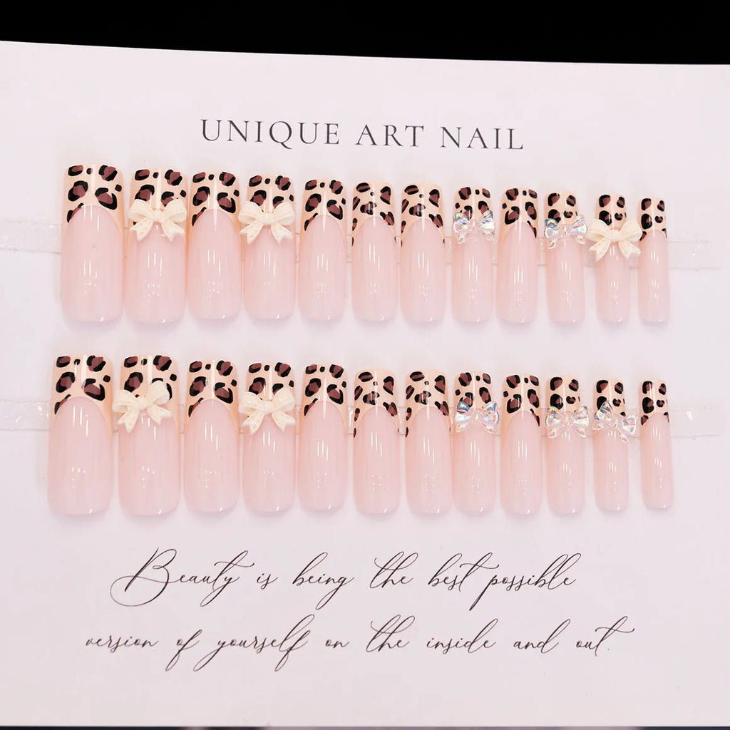 Leopard print butterfly design on plastic nail art pieces, colour WM296