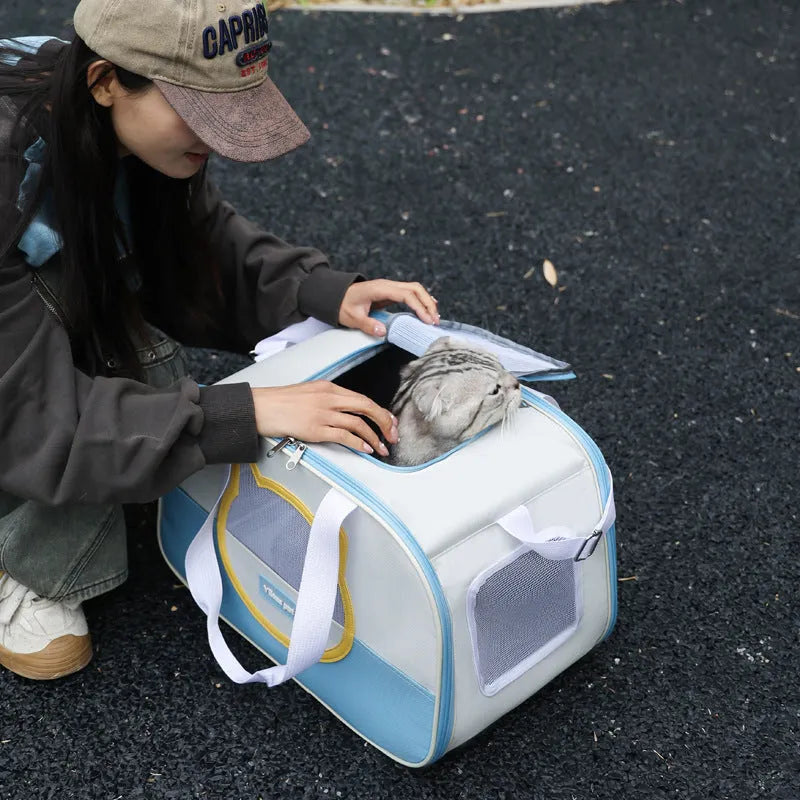 Blue foldable cat backpack made from Oxford cloth with contrast colour pattern and shoulder straps