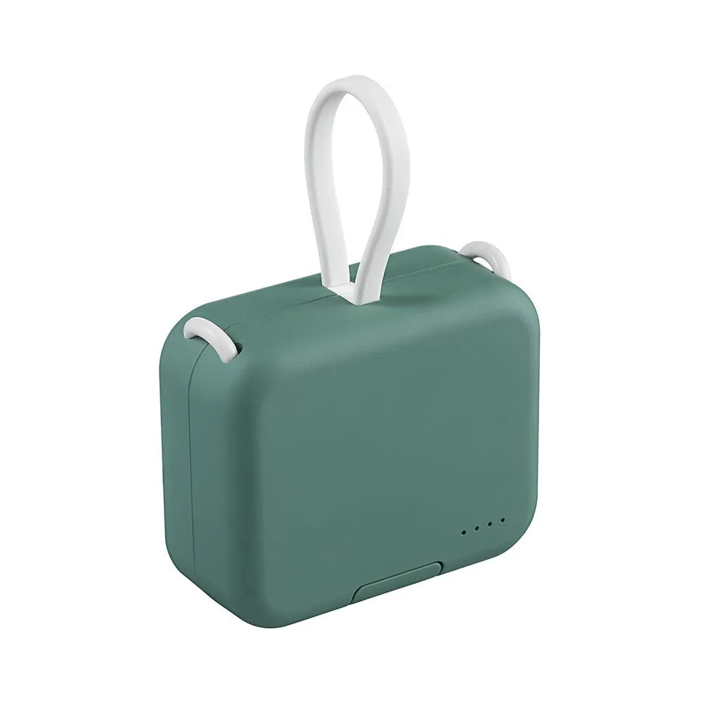 Multi-function bracket mobile power supply in red, green, or purple showing dual charging ports and integrated phone stand.