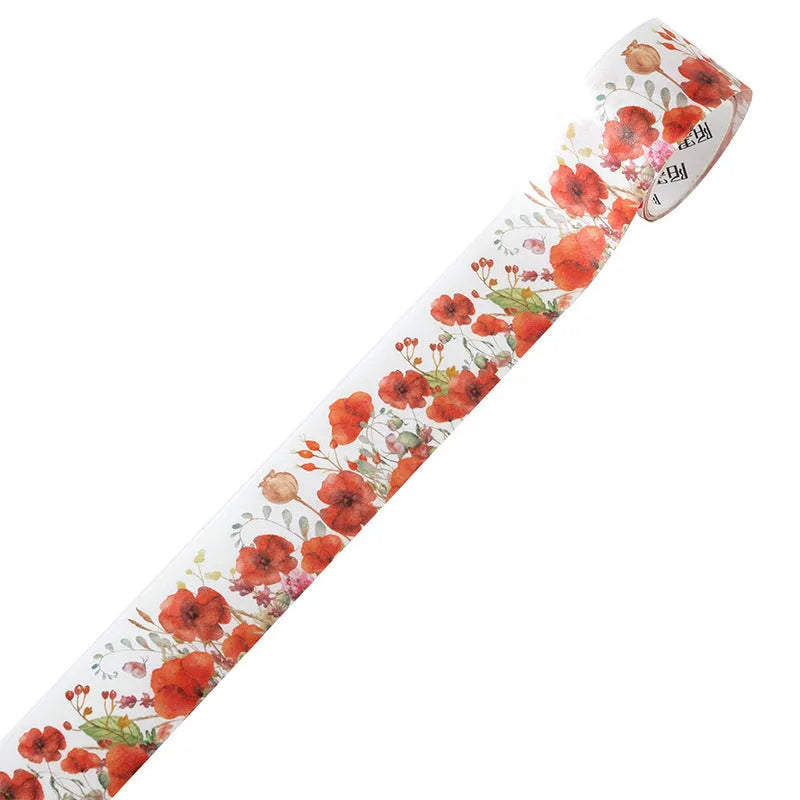 Roll of Japanese paper floral washi tape with vintage watercolour designs for journaling and craft projects
