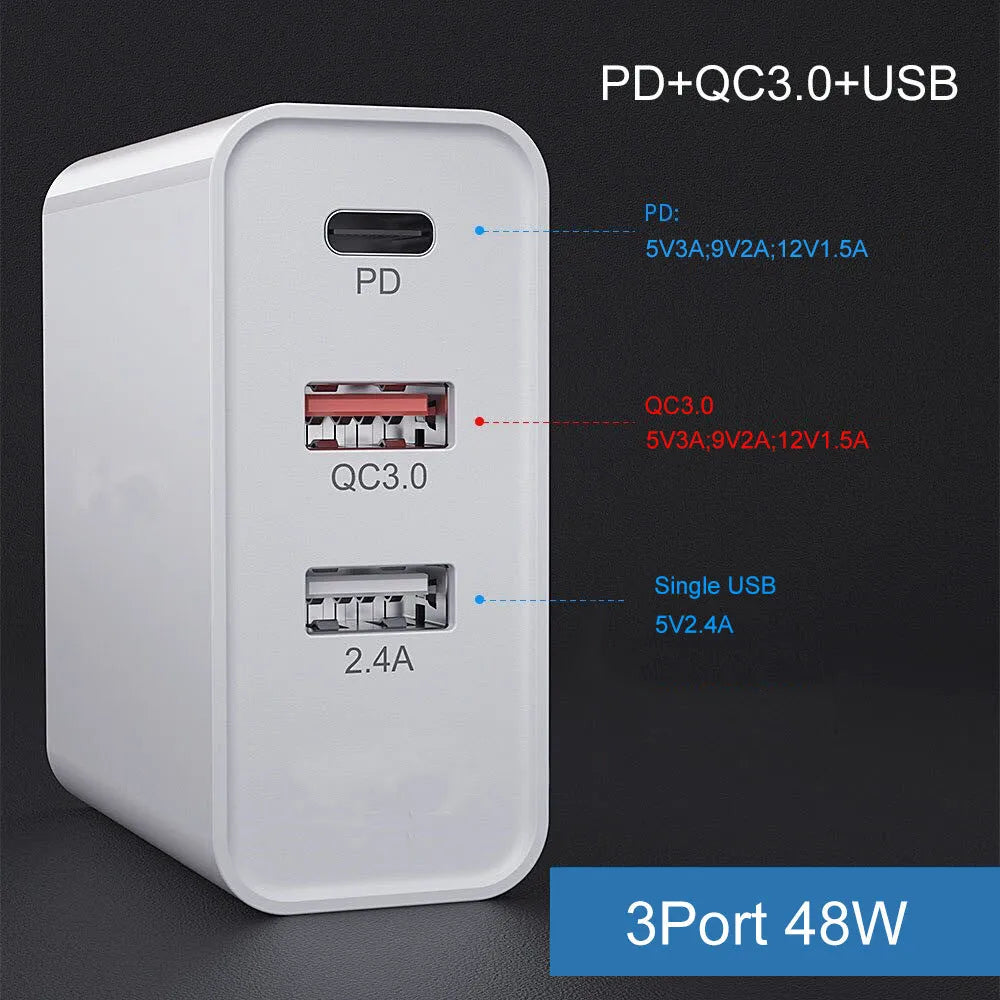 White and black multi-port fast charge USB wall charger with PD and QC support on a wooden surface.
