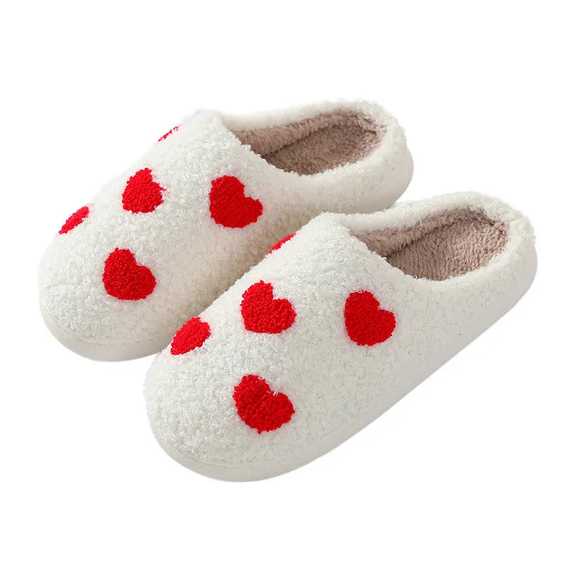 Women's plush round toe slippers with a PVC sole in Big Love colour.