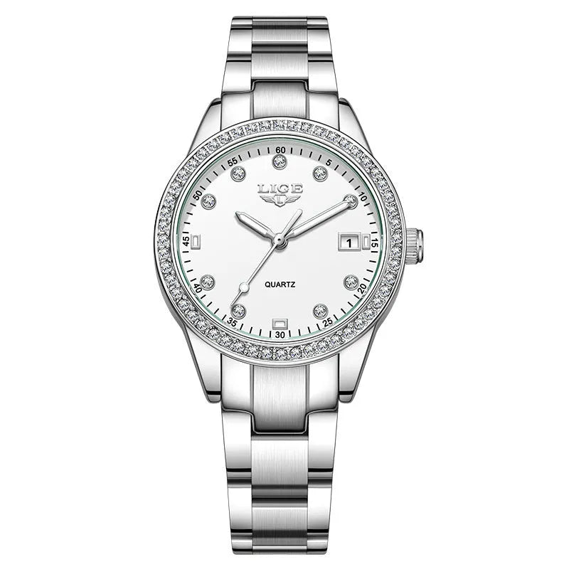 Silver fashion quartz watch with diamond markers on a 34mm stainless steel case and luminous hands.