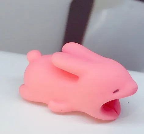 iPhone cable protector in an animal design, showing sleeve placed on charging cable near connector.