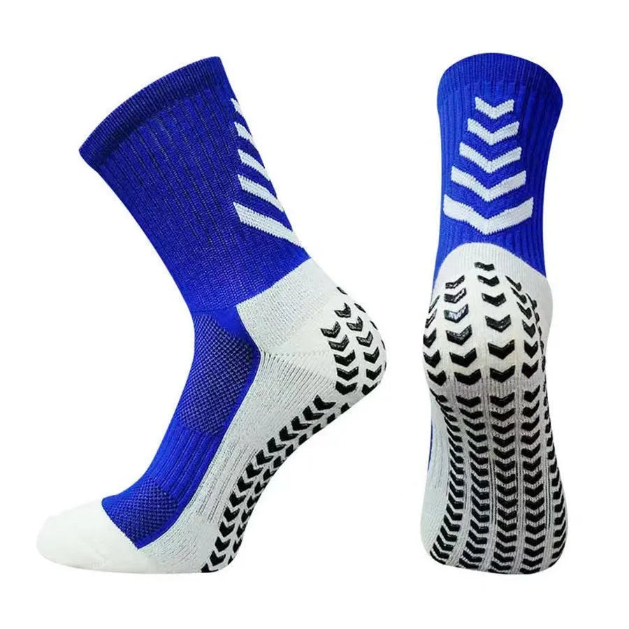 Men's black and green mid-calf athletic socks with a geometric pattern and non-slip silicone grip.