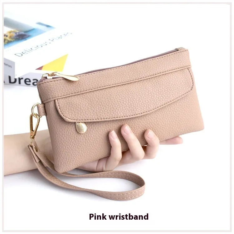 Soft PU leather crossbody bag in a square shape showing the internal sandwich zipper pocket.