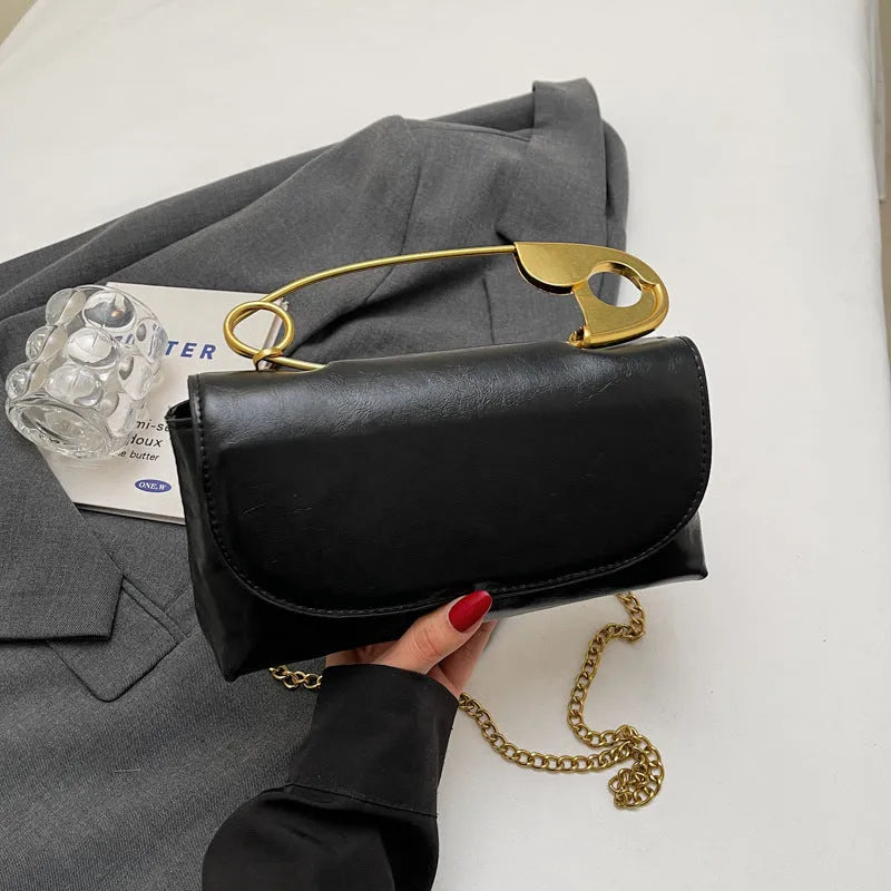 Creative paper clip design PU leather shoulder handbag in horizontal square shape with sandwich pocket